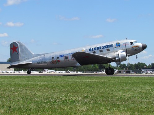 N4550J departing Oshkosh, Wisconsin, on July 21, 2015. Here she wears full ALSIB 2015 titles.
