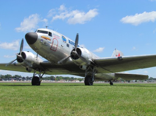 N4550J looms above my head one last time, preparing to depart Oshkosh wearing full ALSIB 2015 livery.